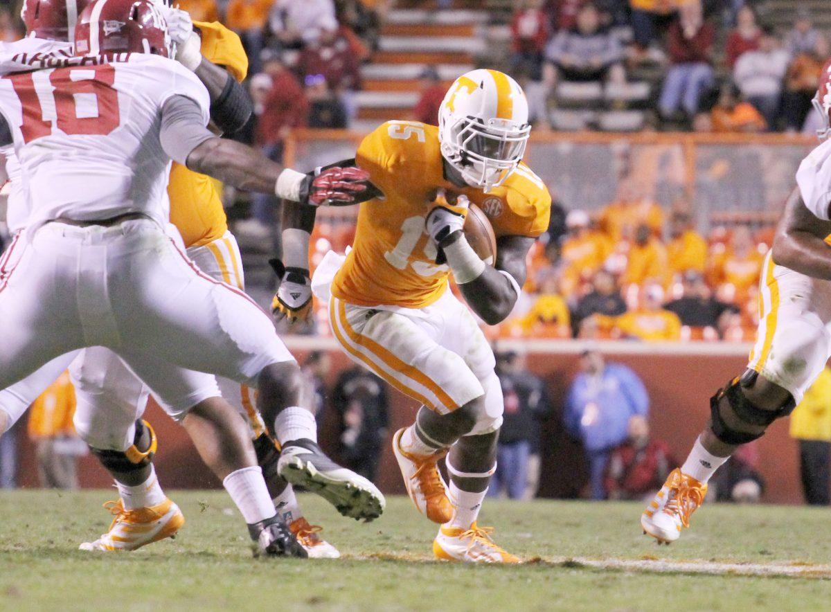 Sophomore running back Marlin Lane streaks through a hole in the Alabama defense on Oct. 20.