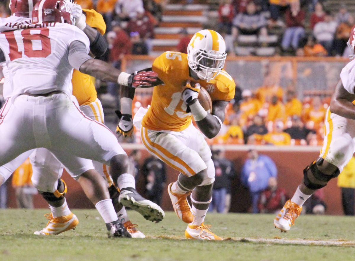 Sophomore running back Marlin Lane streaks through a hole in the Alabama defense on Oct. 20.