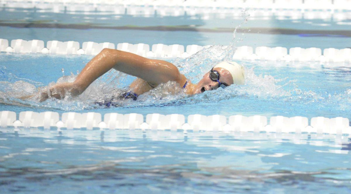 Kelsey Floyd swims the 1000m fly during the Orange and White Intersquad Meet on Friday, Oct. 12.