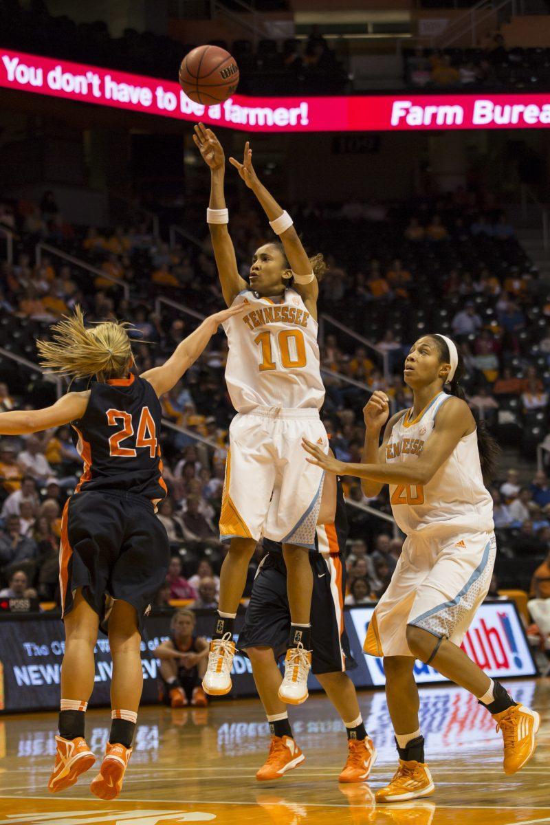 Junior point guard Meighan Simmons shoots a jumper over a Carson Newman defender during the opener game on Thursday, Nov.1. Simmons made a early impact and led the team with 24 points in the debut game.