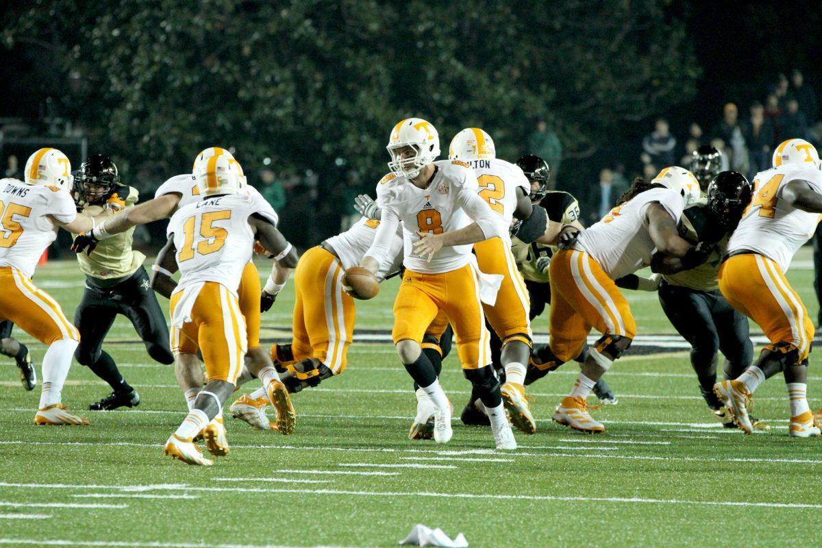 Marlin Lane takes a handoff from Tyler Bray during the Vanderbilt game on Saturday, Nov. 17.