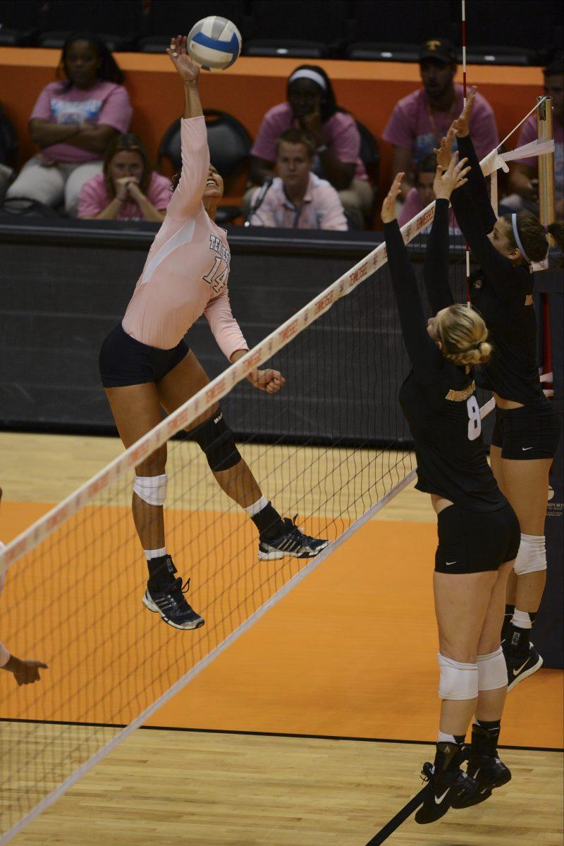 Outside hitter Kayla Jeter slams a shot against the Missouri Tigers on Oct. 5.