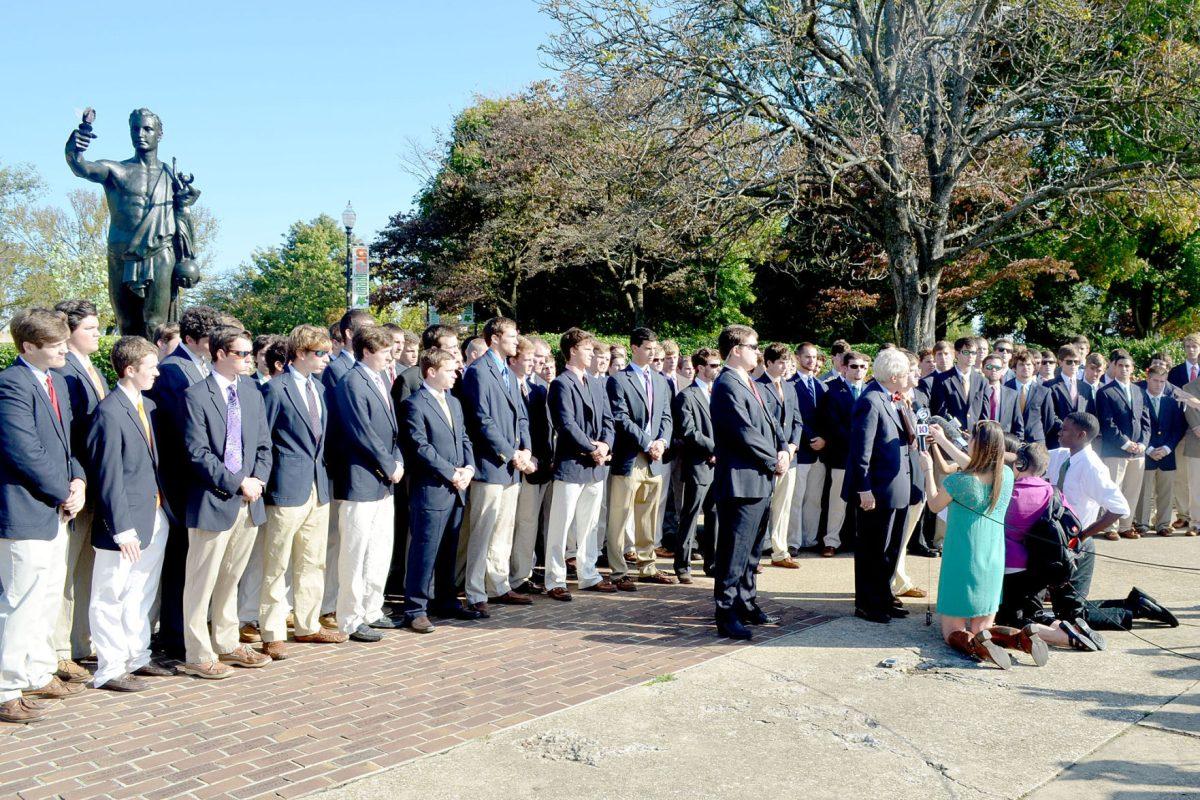 Members of PIKE stand behind Alexander Broughton and attorney Daniel McGehee as they address the media after the PIKE scandal on Oct. 2. Since this incident, Chancellor Cheek has started a Greek task force.