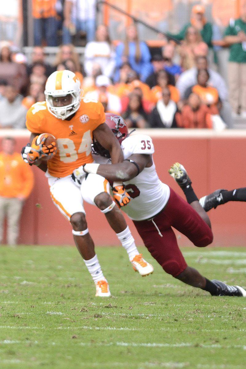 Cordarrelle Patterson tries to escape from a Troy defender on Saturday. The Vols held on to a 55-48 win against the Trojans.