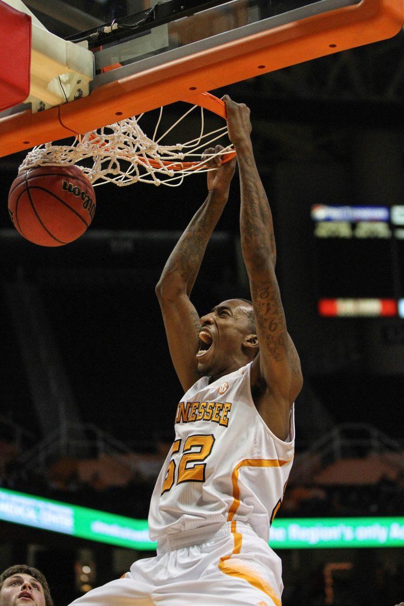 Junior guard Jordan McRae slams the ball against Oakland on Nov. 26.