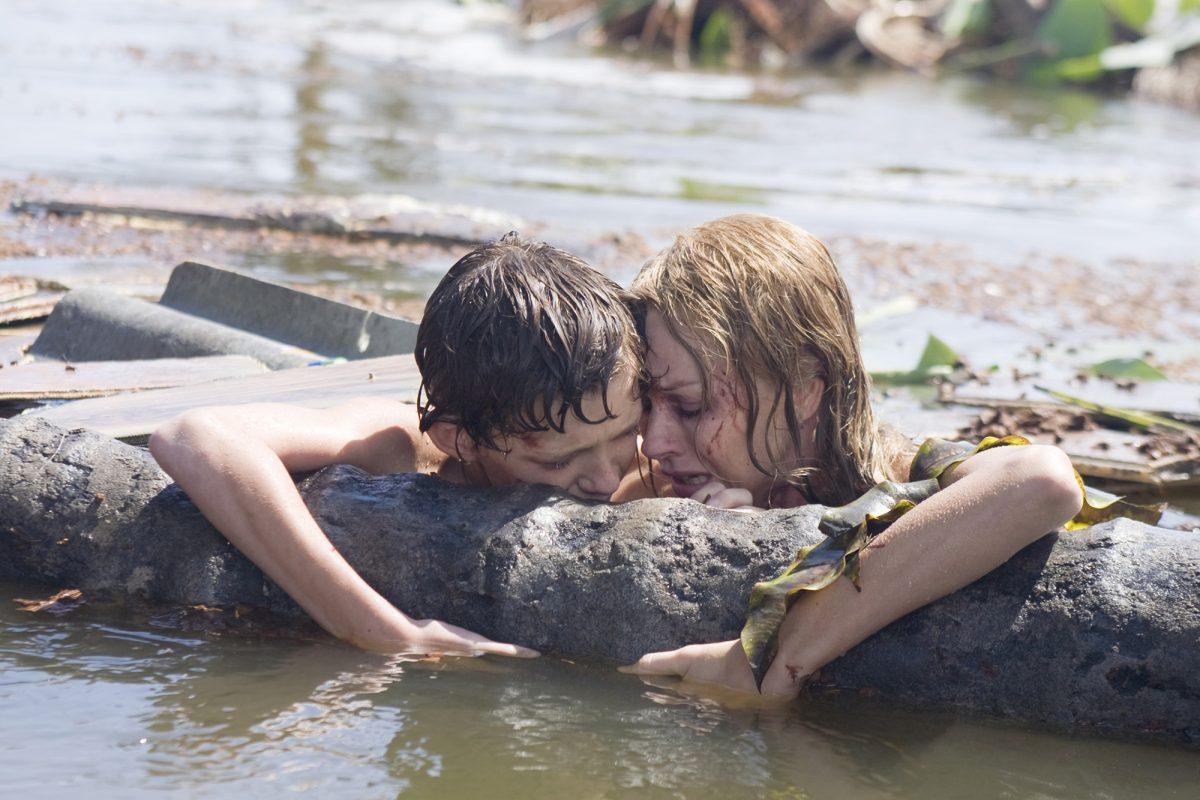 Naomi Watts and Tom Holland star in the film "The Impossible", where a family is separated from a devastating tsunami in Thailand.