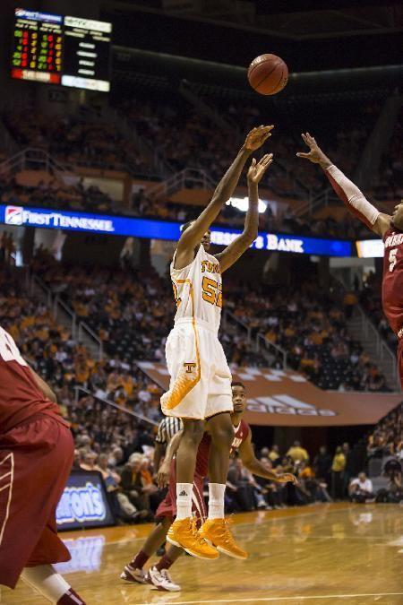 Jordan McRae launches a 3-point shot against Alabama on Saturday. The junior guard led all Vol scorers with 17 points.