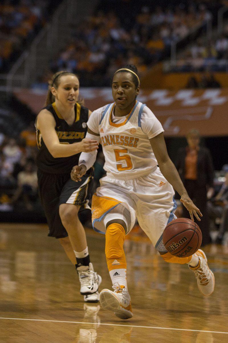 Sophomore point guard Ariel Massengale rushes past a Missouri defender at Thompson-Boling Arena on Jan. 10.