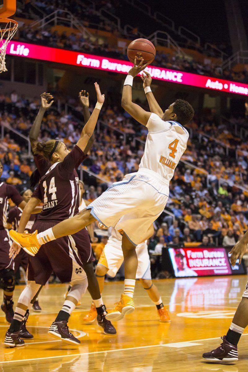 Sohpmore guard Kamiko Williams jumps past Mississippi State defenders against Mississippi State in Thompson-Boling Arena on Thursday, Jan 31. Williams scored 10 points with a career-high of 13 rebounds.