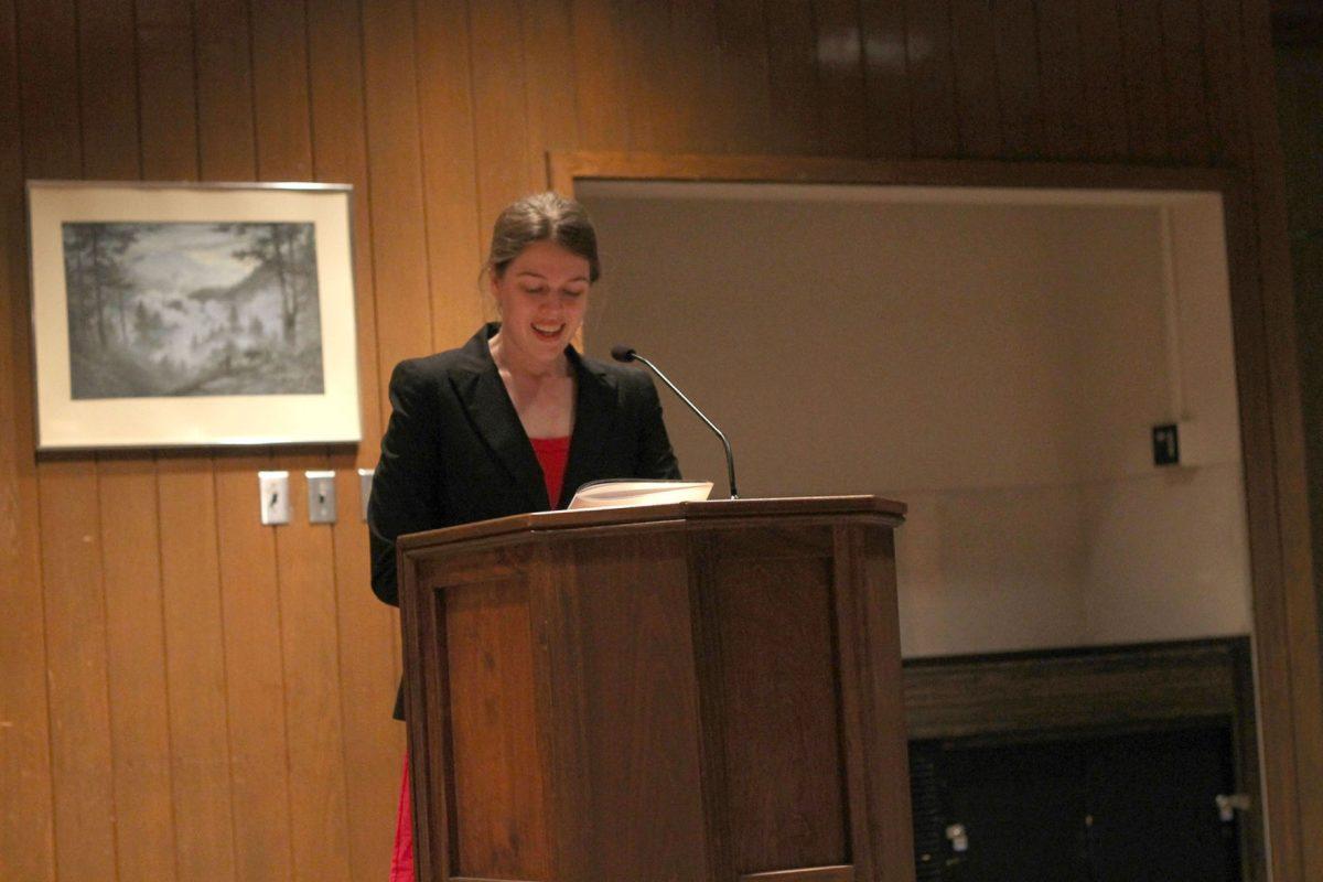 Rachael MacLean, freshman in English, reads her short story, 'Never Be Nighttime,' at the 'Phoenix Literary Arts Magazine's fall reading on Tuesday.