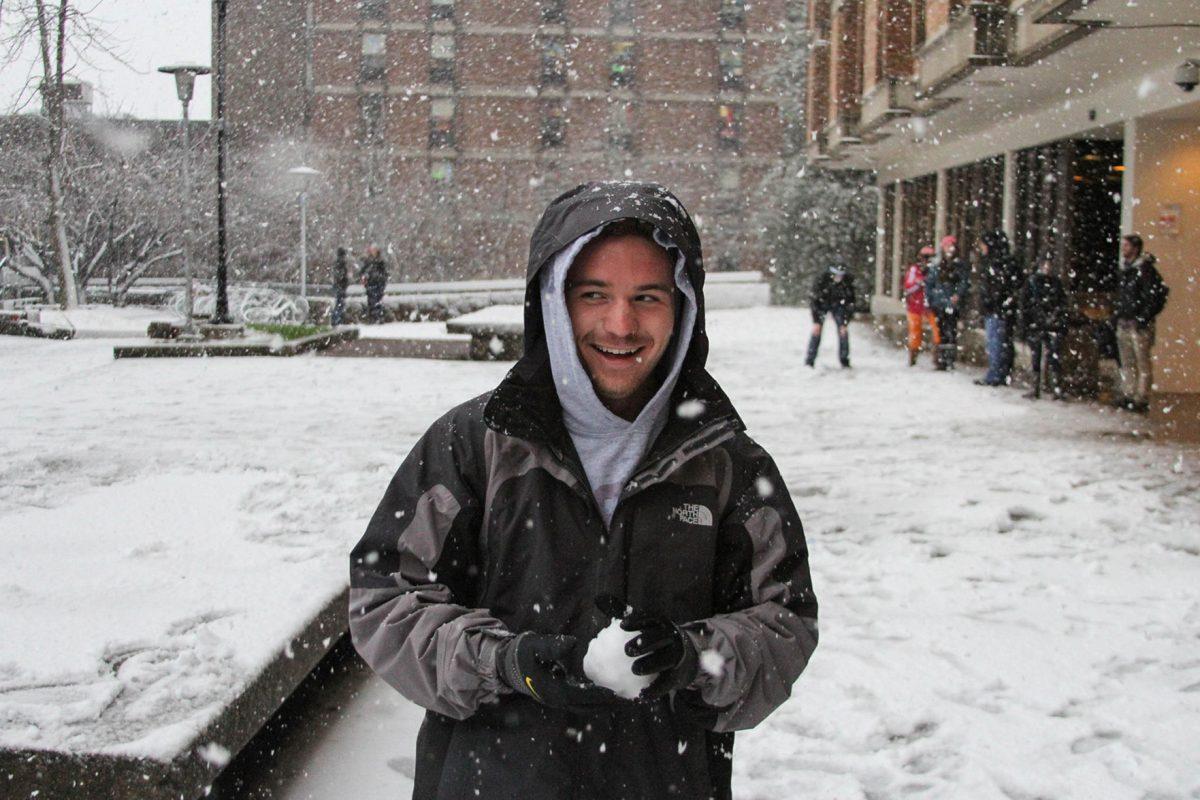 Cameron Hall, sophomore in kinesiology, participates in a snowball fight at Presidential Court on Jan. 17.