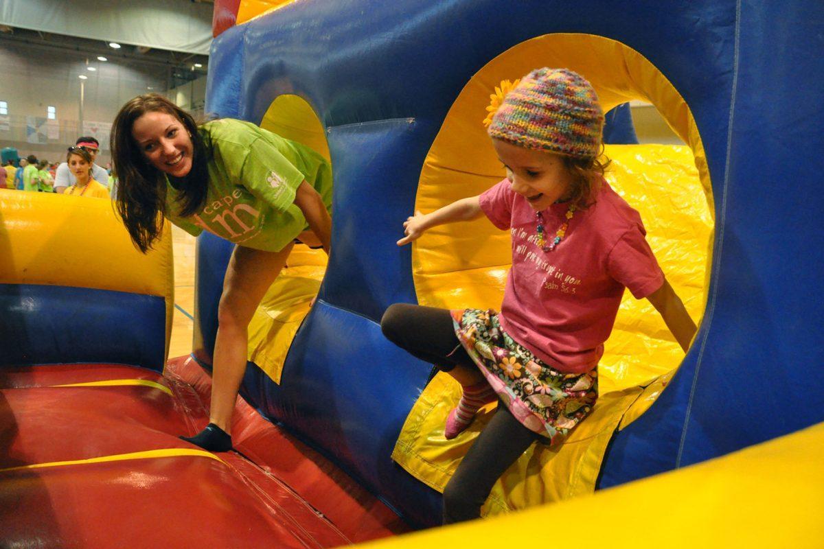 A student races against one of the children benefited from the Dance Marathon event in TRECS on Feb. 1, 2012. Proceeds from the event go to the East Tennessee Children Hospital to assist funding treatment costs for families.