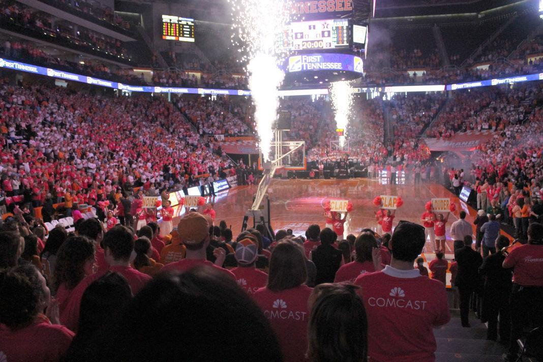 The crowd supports 'Live Pink' with pink and white shirts during the Lady Vols game on Sunday.