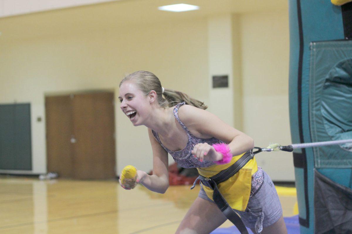 A student competes in an obstacle course at Vol Night Long.