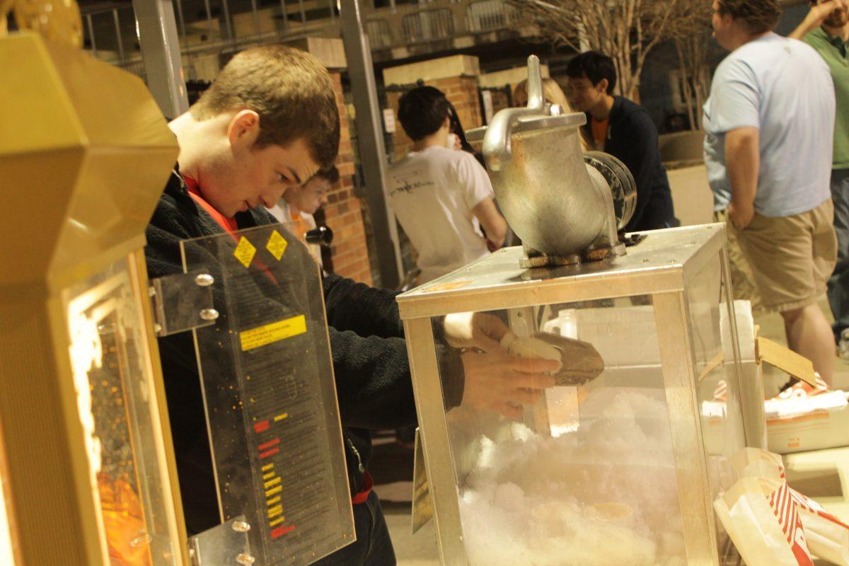 A student makes a snowcone during VOLNight Long on Friday.