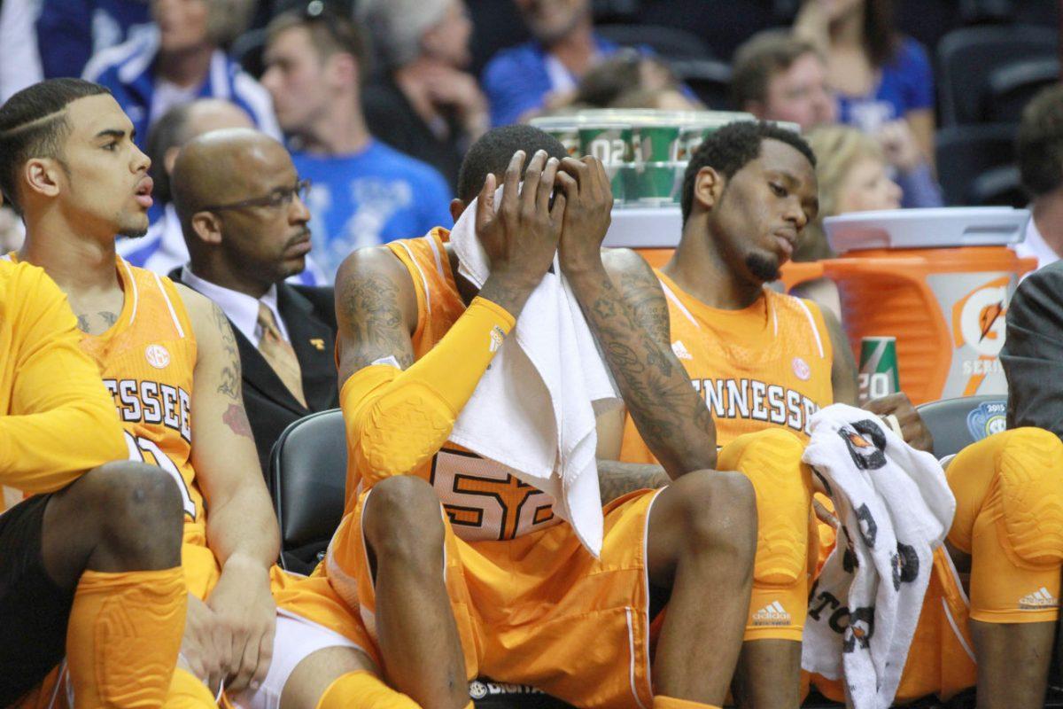 Jordan McRae sits on the bench after fouling out against Alabama in the SEC Tournament on March 15.