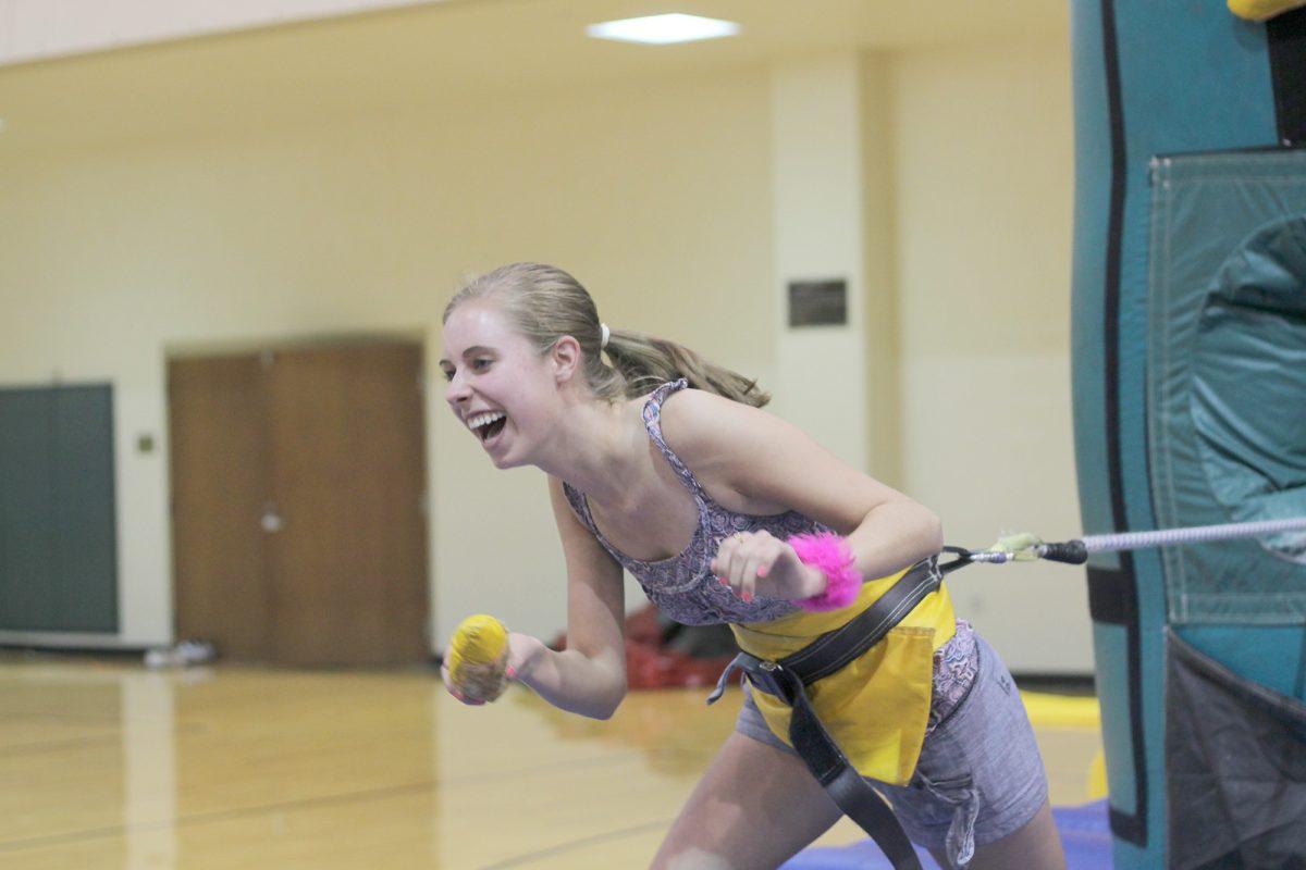 A student competes in an obstacle course at Vol Night Long.