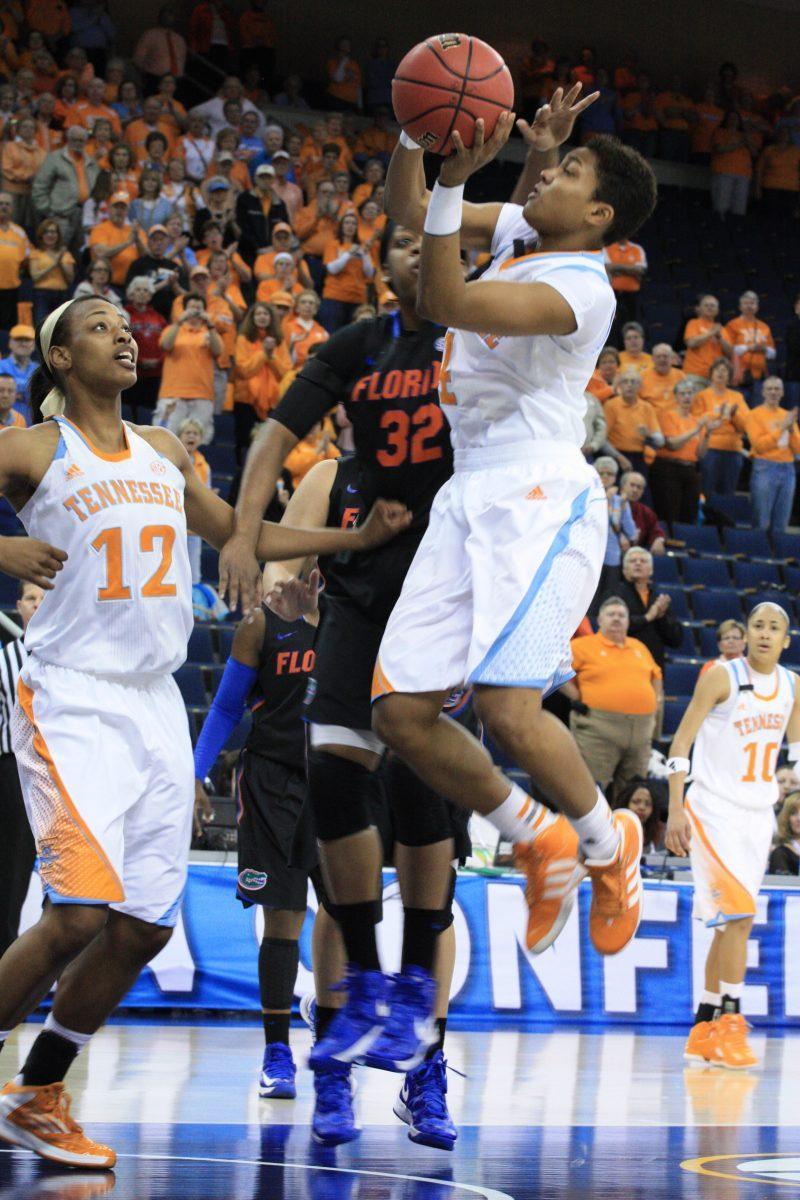 Senior Kamiko Williams goes up for a contested shot in the lane against the Florida Gators during the SEC Women's Baskteball Tournament.