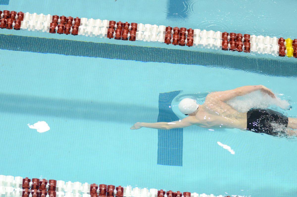 Ed Walsh swims during SEC Championships in College Station, Texas.