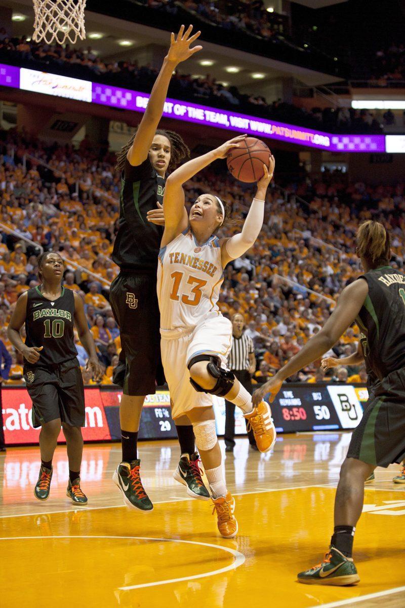 UT forward Taber Spani attempts a layup against Baylor's Brittany Griner on Nov. 27, 2011. Griner's career came to an unexpected halt when the Bears lost to Louisville in the Sweet Sixteen round on Sunday.
