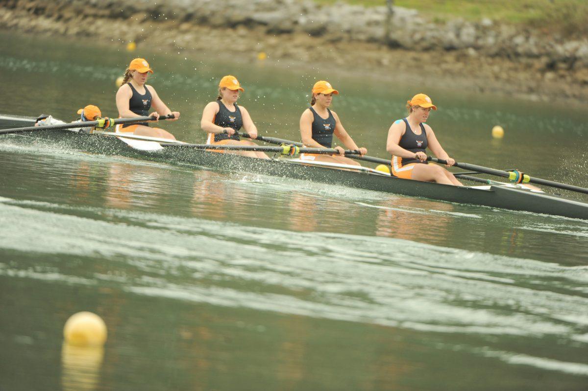 The Tennessee Lady Volunteers and the Louisville Cardinals compete in a regatta event on March 30