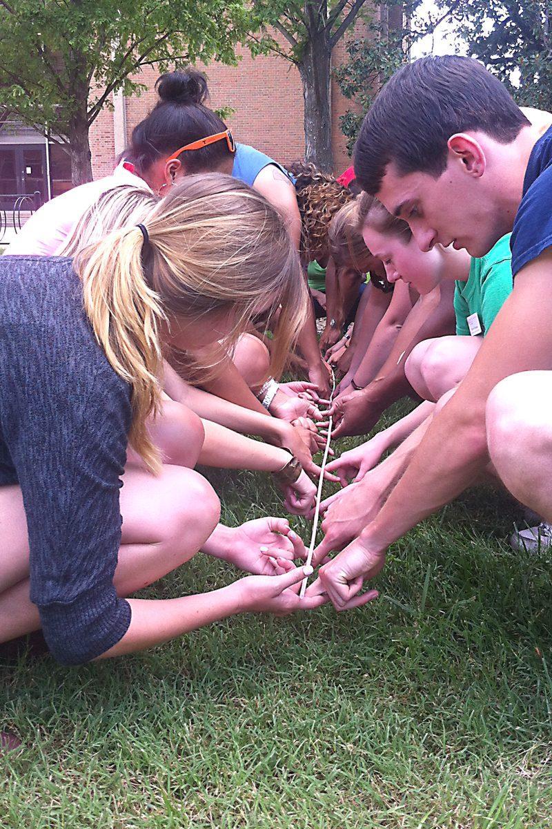 Students participate in a team building exercise during the Ignite leadership program at the Ignite Summit retreat in 2012.