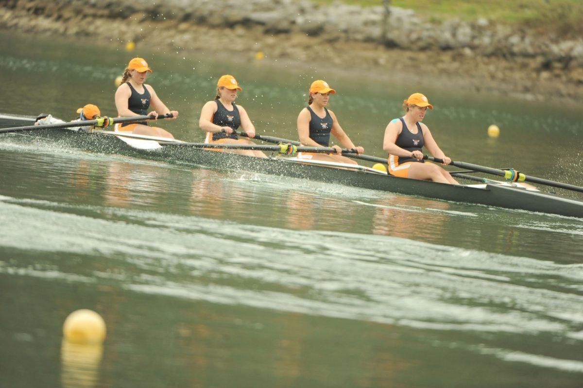 The Tennessee Lady Volunteers and the Louisville Cardinals compete in a regatta event on March 30