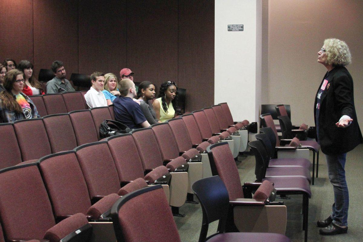 Lynn Stacco talks to the audience during the lecture 'From Rocky Bottom to a Rocky Top' on Tuesday as a part of 'Sex Week.'