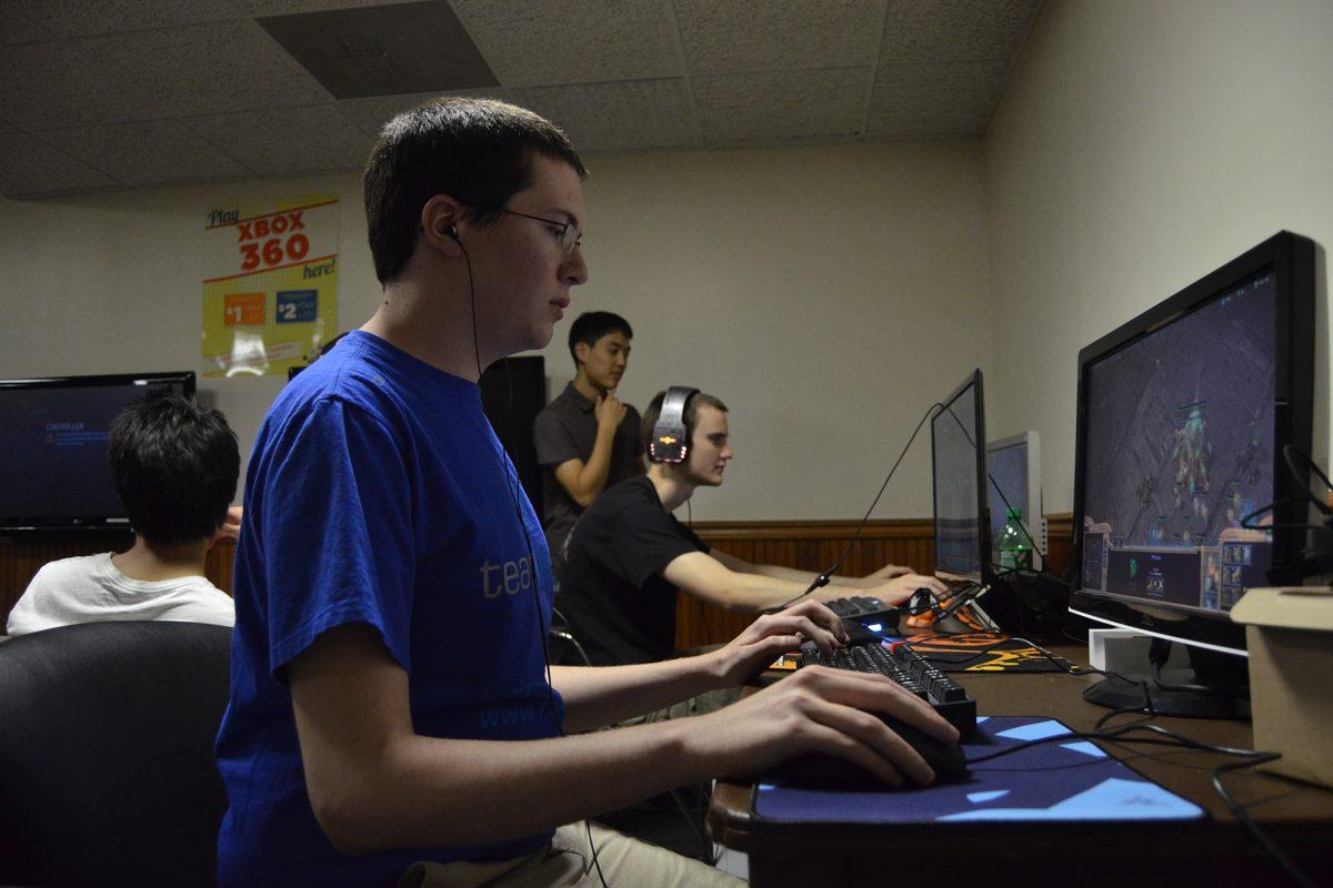 Ben Peterson, senior in materials science, and David Polly, junior in nursing, play Starcraft during the Frag for a Cure event in the UC Down Under on Friday on April 24, 2012.