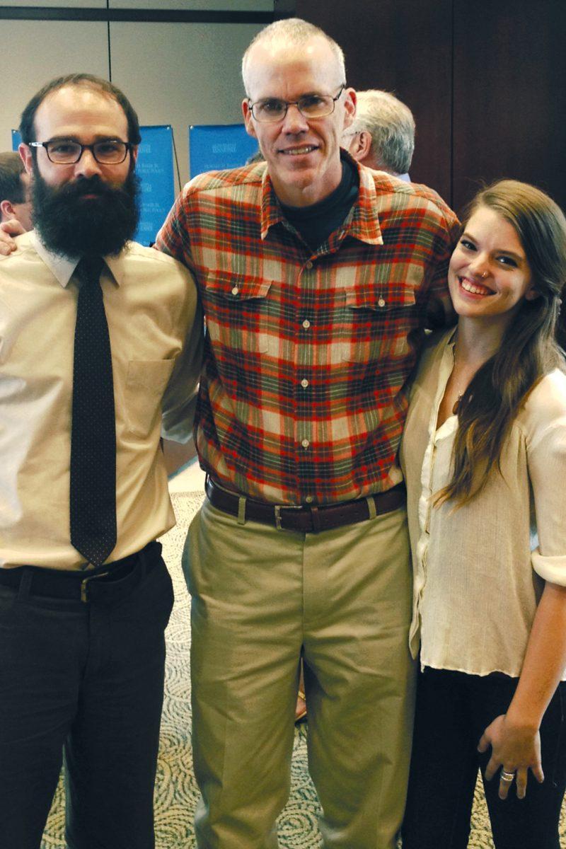Bill McKibben, author of UT's 2013 Life of the Mind selection, "Eaarth: Making a Life on a Tough New Planet," poses with SPEAK co-presidents Eric McKanly and Lindsey Huff after speaking to a small group of environmentally interested students and faculty Tuesday morning