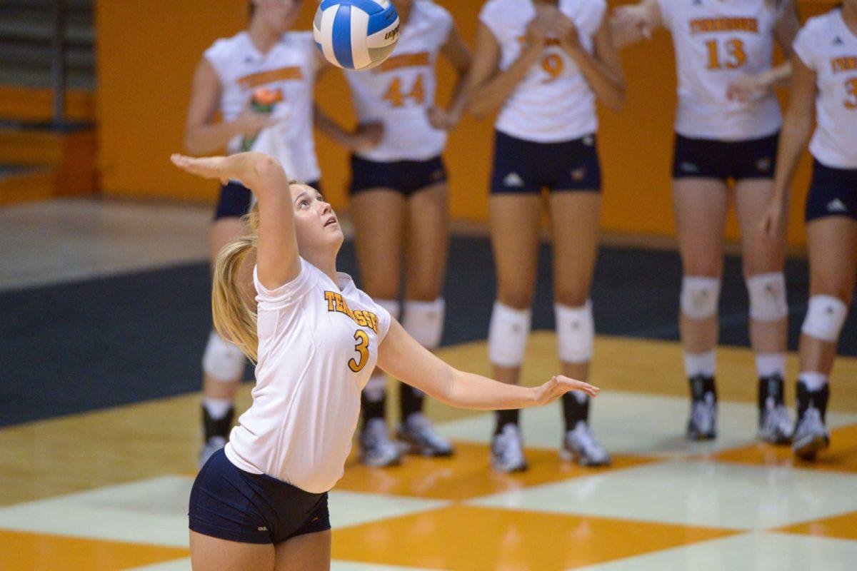 Freshman Abby Brewer sets for a strong serve during the Comcast Lady Vol Classic against the Wichita State University Shockers at Thompson-Boling Arena on Sept. 13.