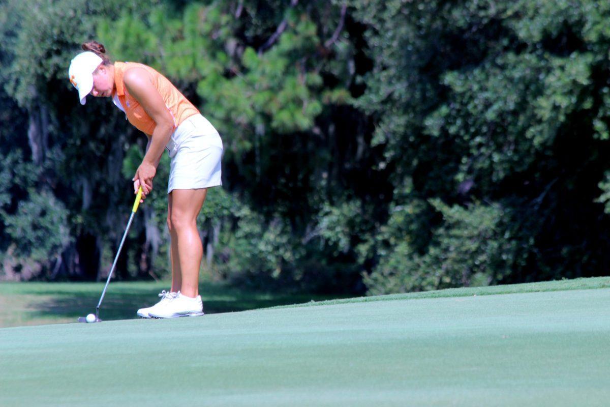 Sophomore Emmie Pietila lines up for a putt in the Cougar Classic in Charleston, S.C. on Sept. 10.