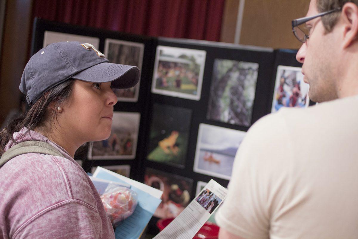 Hannah Dill, left, junior in communication studies, speaks with Matt Stevens, the associate director of UGA Costa Rica. "(I'm) just here weighing my options," Dill said. "Costa Rica looks pretty awesome."