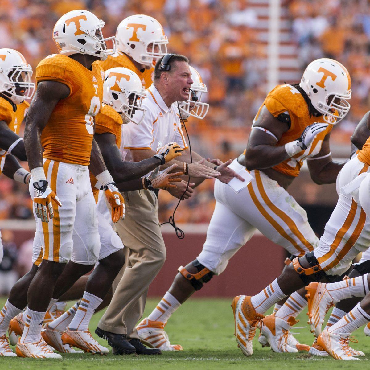 Butch Jones applauds a play against Austin Peay on Aug. 31. He said he believes there is still plenty of room for improvement against Western Kentucky on Saturday.