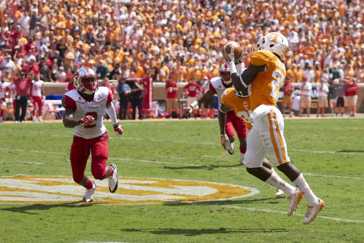 Cornerback Justin Coleman intercepts a pass from Western Kentucky quarterback Brandon Doughty in the Vols 52-20 win on Sept. 7. The Vols forced five turnovers in the first quarter and finished with seven total for the game.