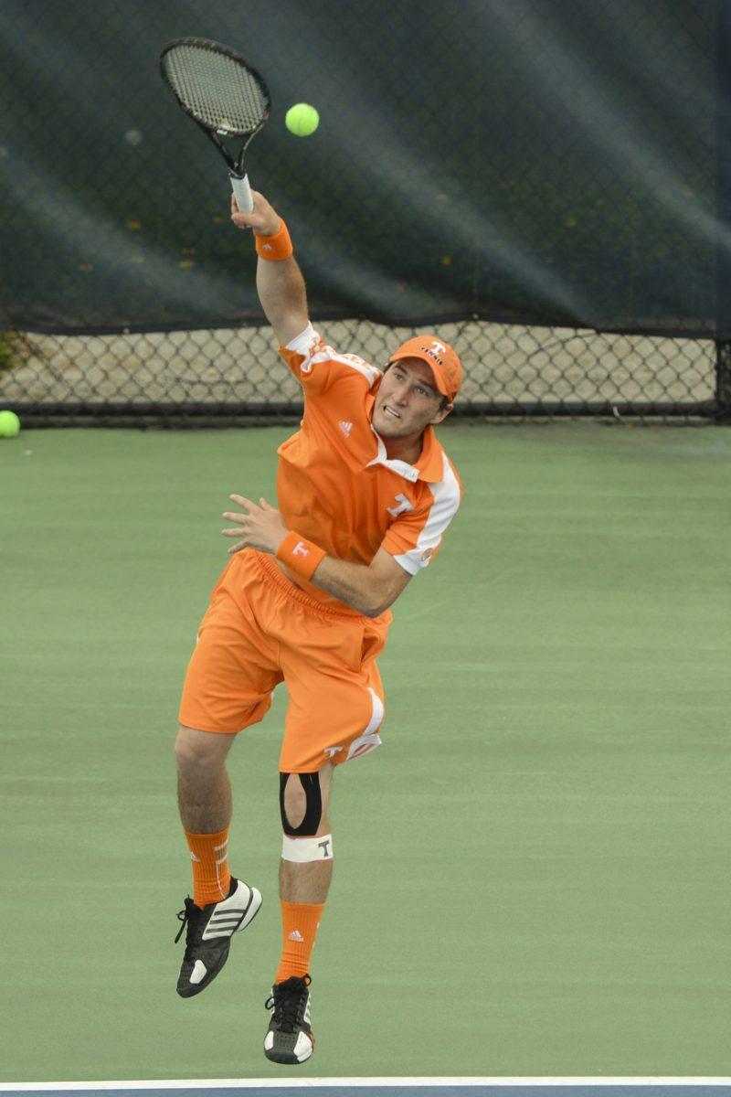 Hunter Reese serves in a match against the Auburn Tigers on April 14.