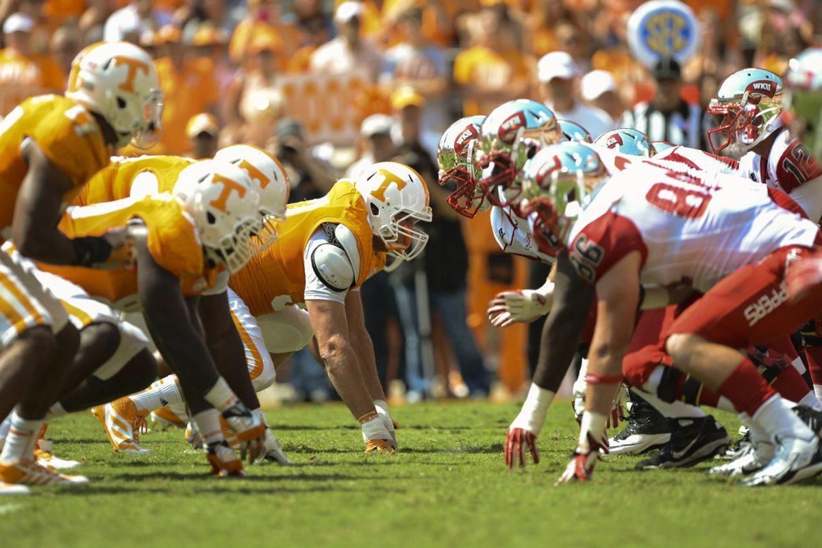 The Tennessee defensive line waits for Western Kentucky to snap the ball at Neyland Stadium on Saturday, Sept. 7.