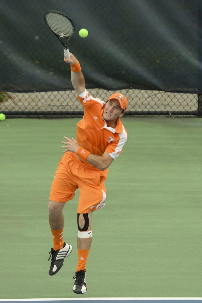 Hunter Reese serves in a match against the Auburn Tigers on April 14.