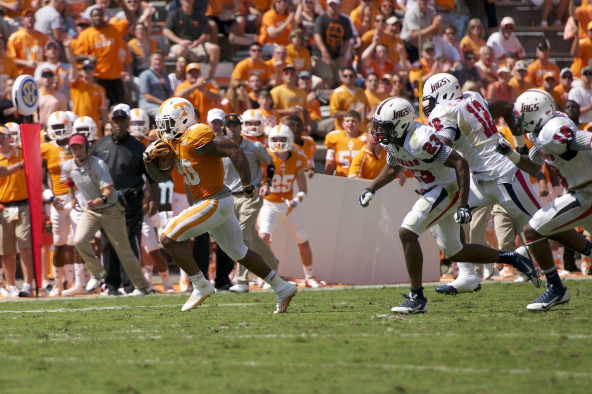 Rajion Neal outruns his South Alabama defenders at Neyland Stadium on Sept. 28. UT went on to win against the Jaguars, 31-24.