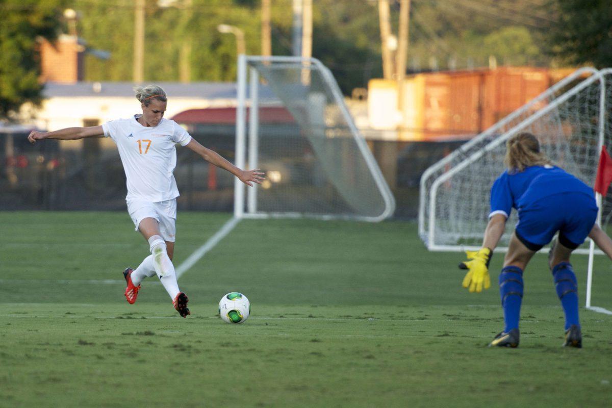 Forward Hannah Wilkinson winds up for a shot against Dayton at Regal Stadium on Friday, Sept. 6.