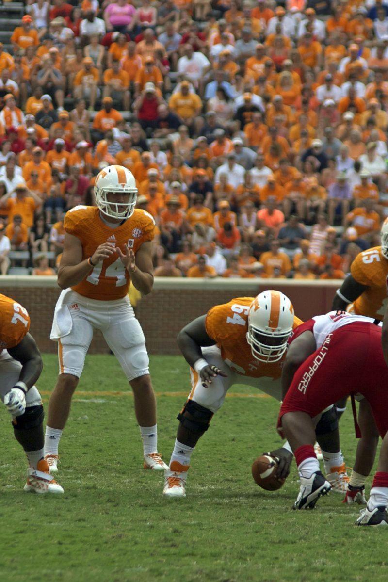 Quarterback Justin Worley prepares to receive a snap from center James Stone in Tennessee's 52-20 win over Western Kentucky at Neyland Stadium on Saturday, Sept. 7.