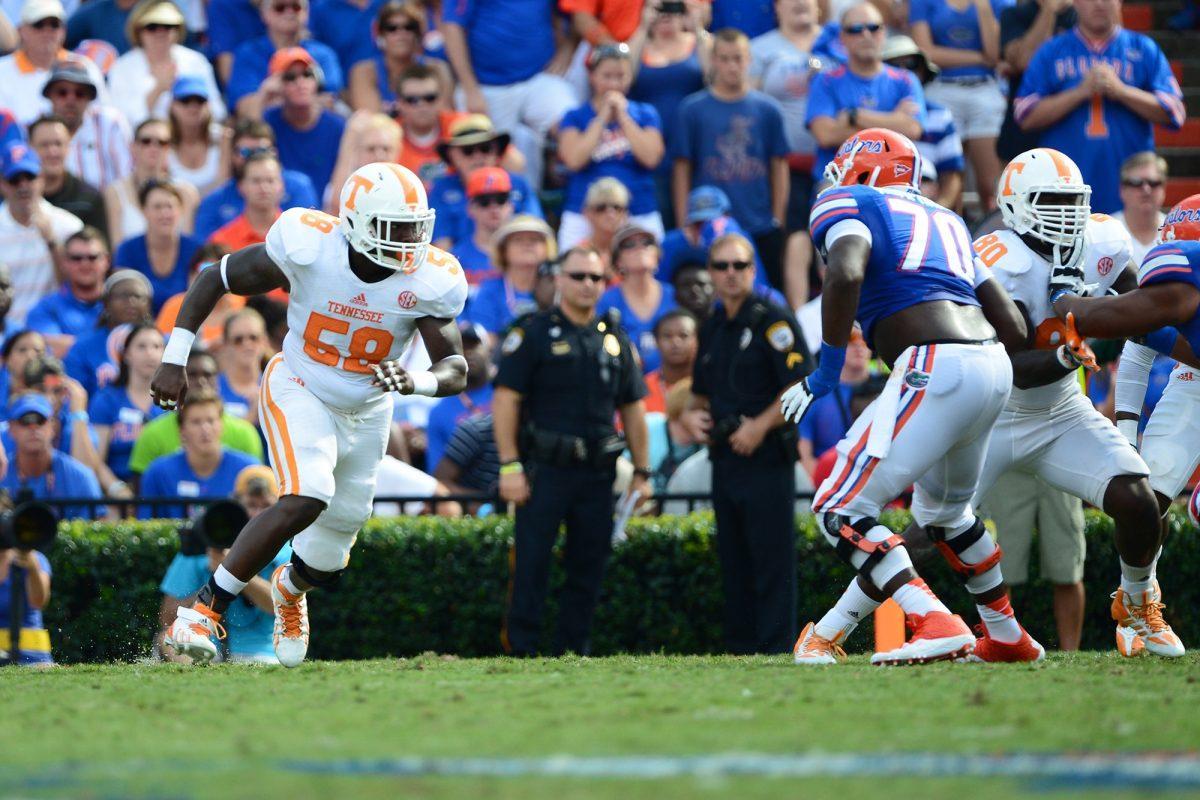 Senior defensive end Marlon Walls rushes the quarterback against No. 19 Florida at Ben Hill Griffin Stadium on Saturday, Sept. 21.