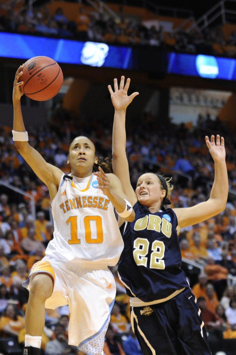 Senior shooting guard Meighan Simmons touches a layup off the backboard against Oral Roberts at Thompson-Boling Arena on March 23. The Lady Vols open play on Nov. 4.