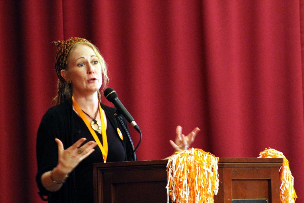 Tricia Hepner, associate professor of anthropology and co-director of the university's new Disasters, Displacement and Human Rights program, presents "Anthropology as a Tool for Improving the Human Condition" at the Pregame Showcase in the UC on Sept. 28.