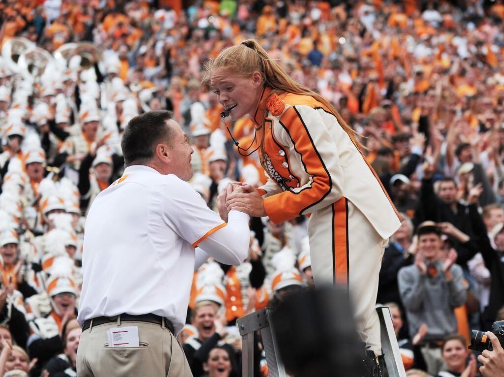 Tennessee Head Coach Butch Jones and Pride of the Southland Marching Band Drum Major Jessica Henderson.