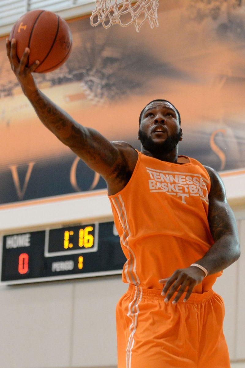 Fifth-year senior forward Jeronne Maymon attempts a layup during basketball practice at Pratt Pavilion on Oct. 1. Maymon is returning to the starting lineup in this fall after being sidelined with a knee injury that forced him to redshirt in last season.