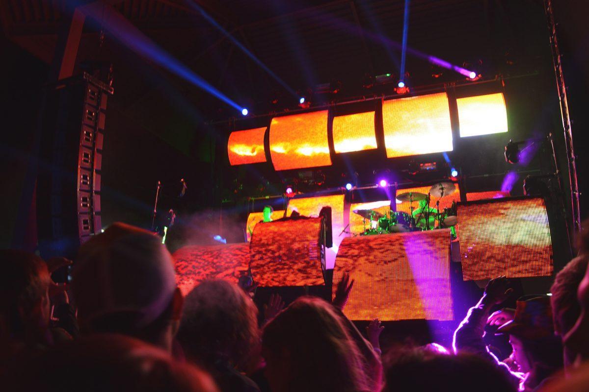 Audience members enjoy the light show that accompanied Big Gigantic's performance Oct. 18 in the Old City Courtyard.
