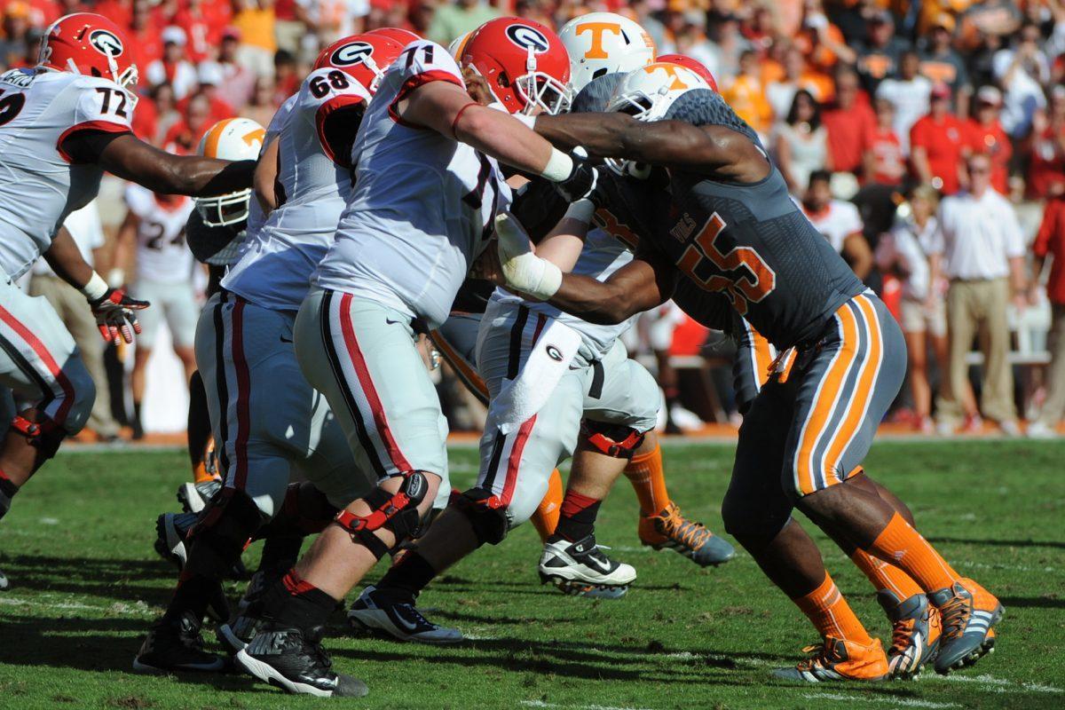 Tennessee senior defensive end Jacques Smith rushes the quarterback in a game against Georgia at Neyland Stadium on Oct. 5.