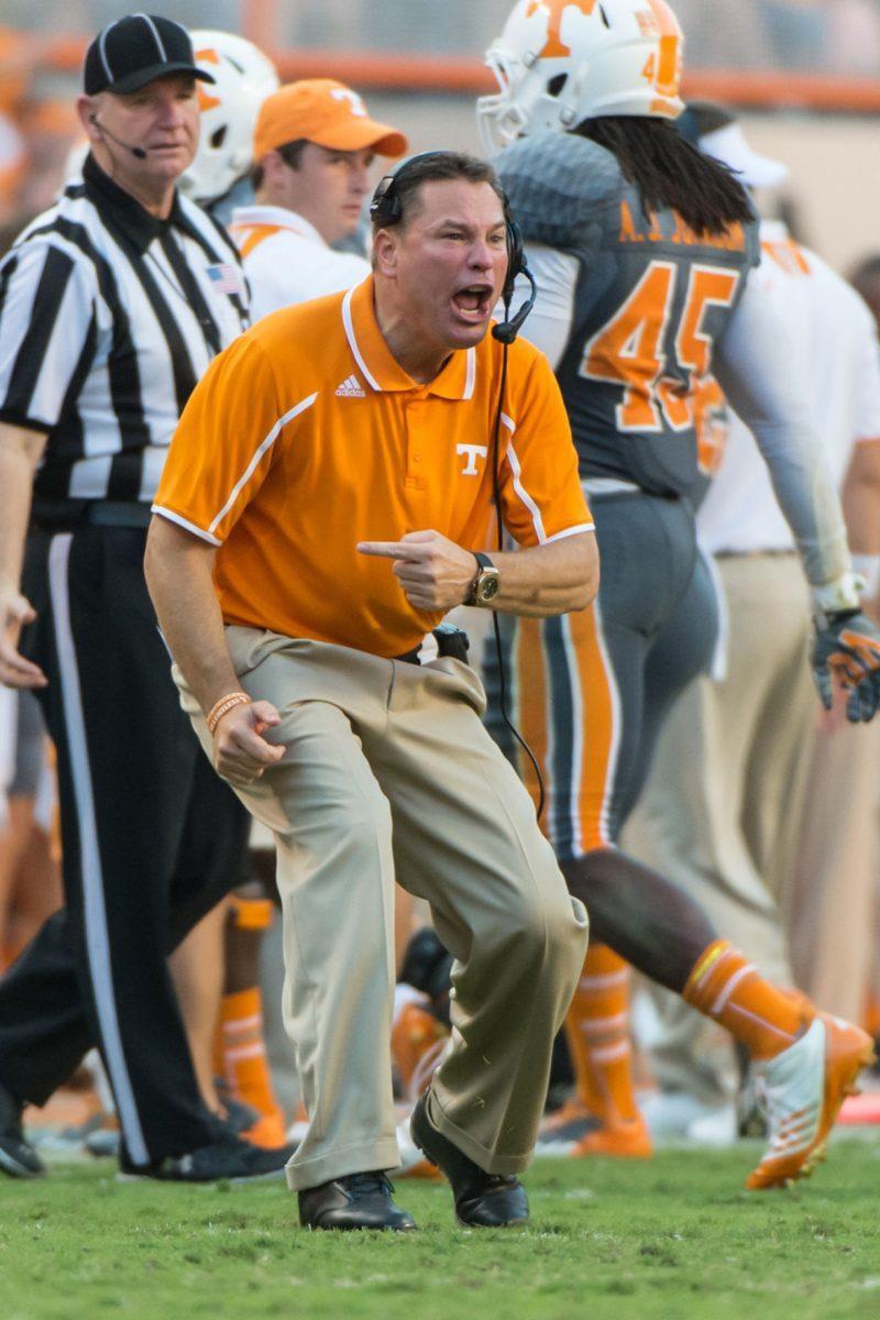 Tennessee coach Butch Jones yells at his squad during a game against the Georgia Bulldogs on Oct. 5, 2013 at Neyland Stadium.
