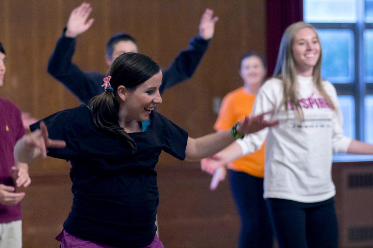 Sheila Von Mayer, left, an Anytime Fitness Zumba instructor, leads a workout during the Special Spaces Zumbathon at the UC on Nov. 4. "I like everything about Zumba; it's just awesome," Mayer said. "It's always different and fun."